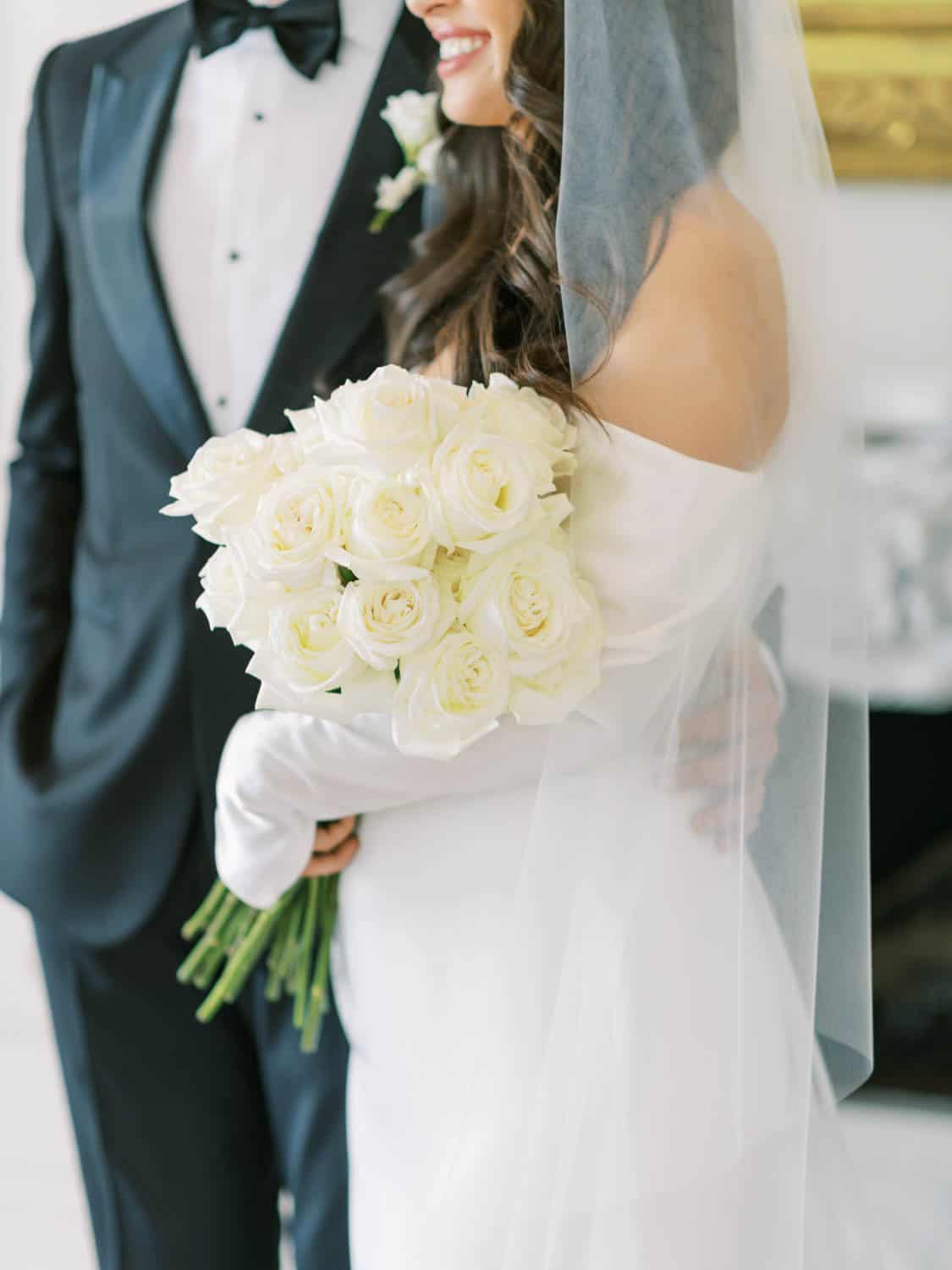 Beautiful white wedding bouquet with roses for special occasions.