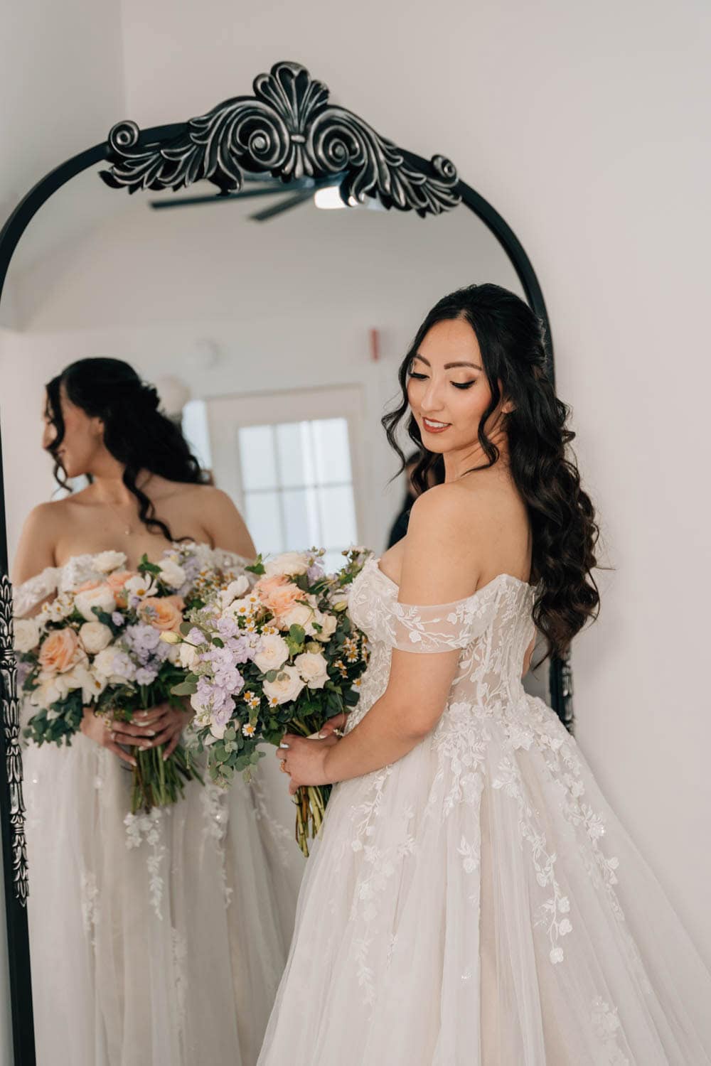 Bridal bouquet featuring fresh, elegant flowers from Simply Blessed Flowers. Perfect for weddings an.