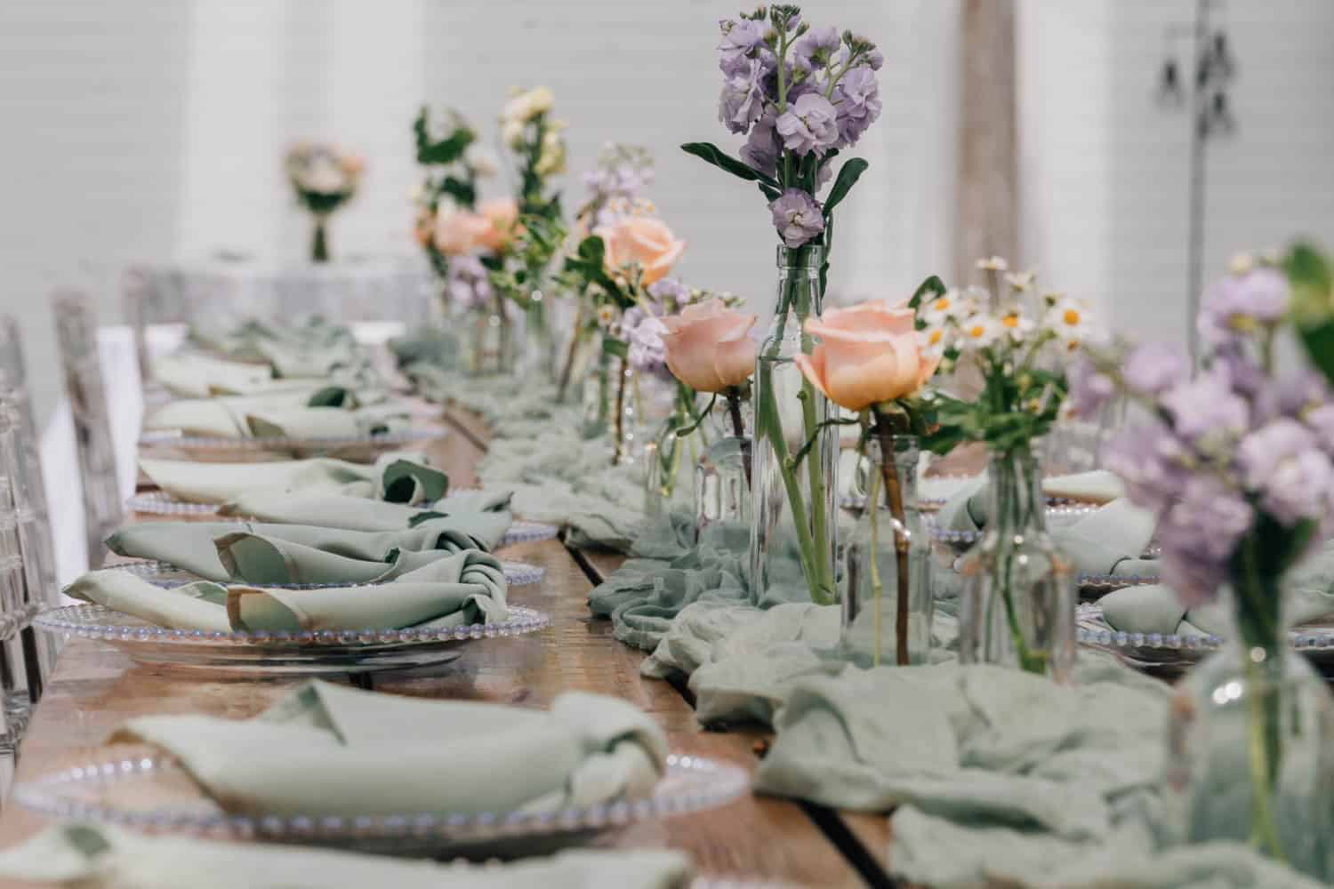 Beautiful floral arrangement with roses and lavender for wedding or special occasion decor.