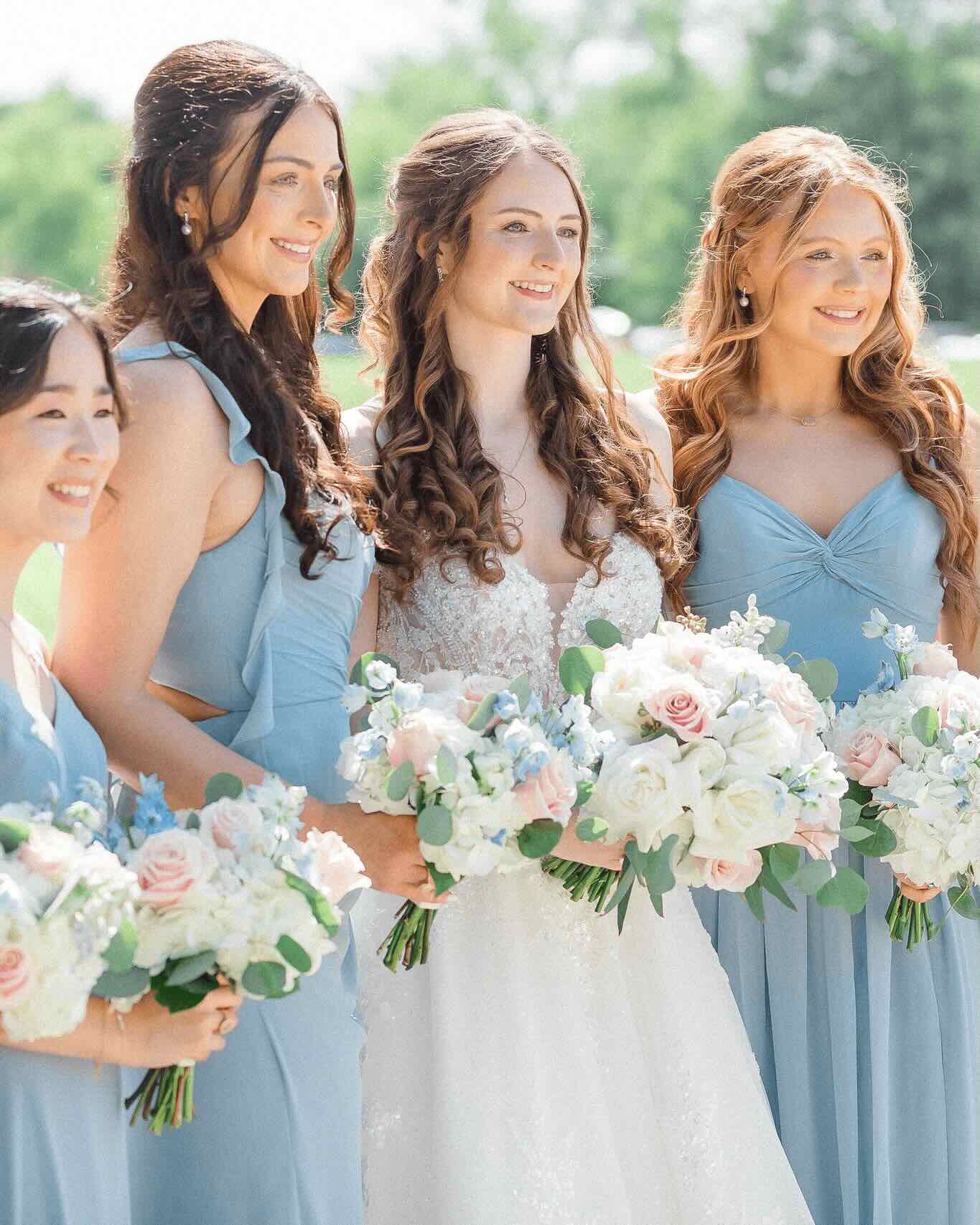 Bridal bouquet featuring pastel roses and peonies, perfect for weddings from Simply Blessed Flowers.