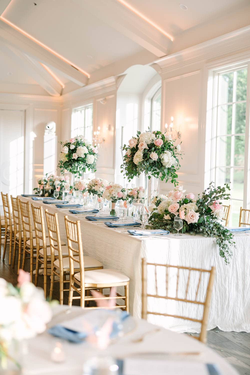 Elegant floral arrangements for weddings and events by Simply Blessed Flowers.