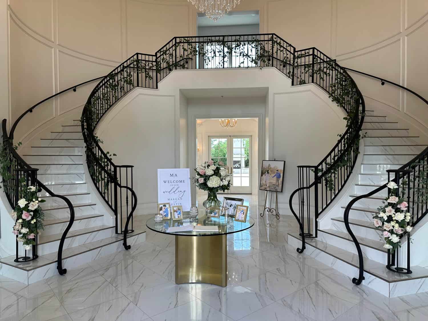 Beautiful floral arrangements decorating the staircase at Simply Blessed Flowers.