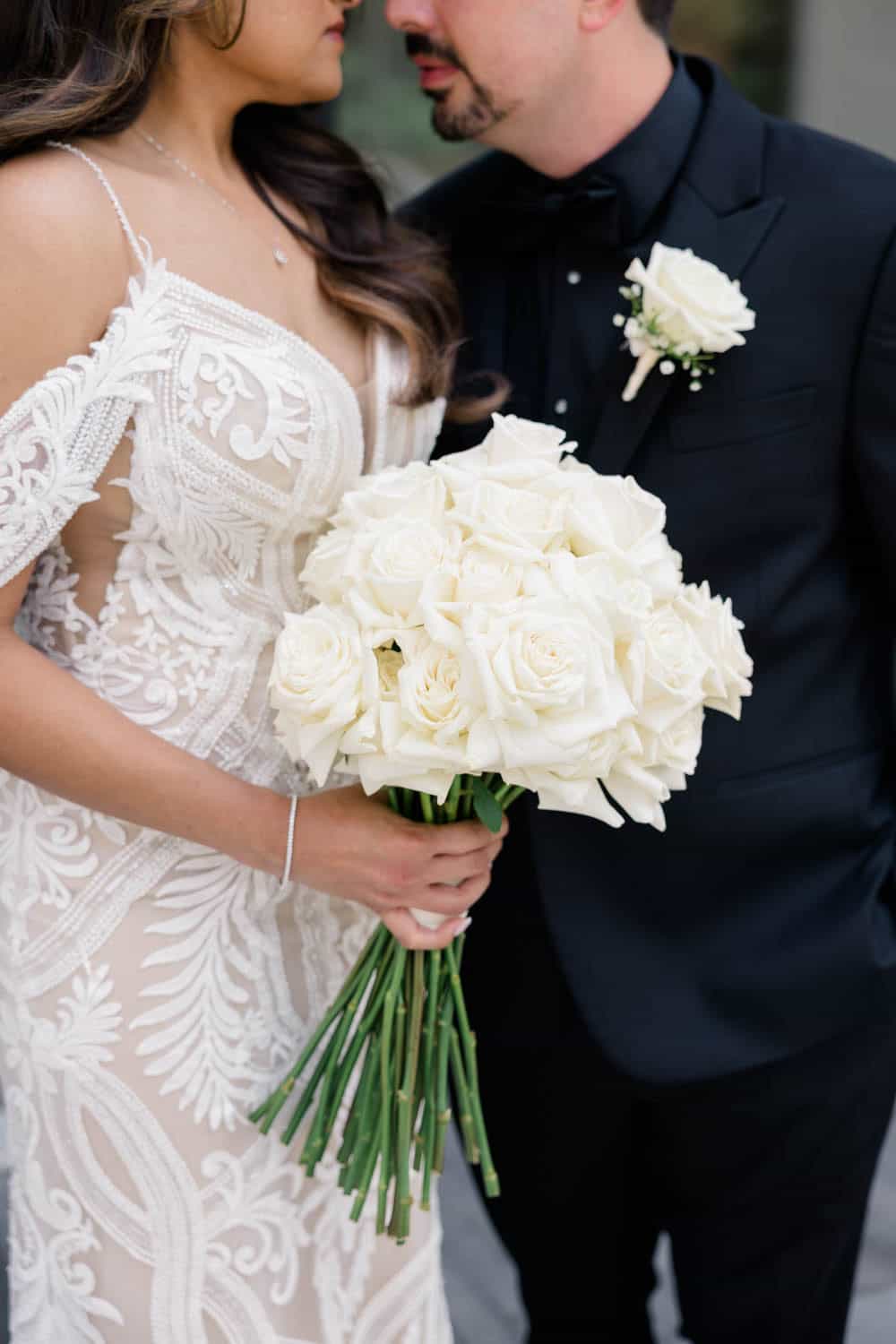 Elegant wedding bouquet featuring white roses for special occasions.