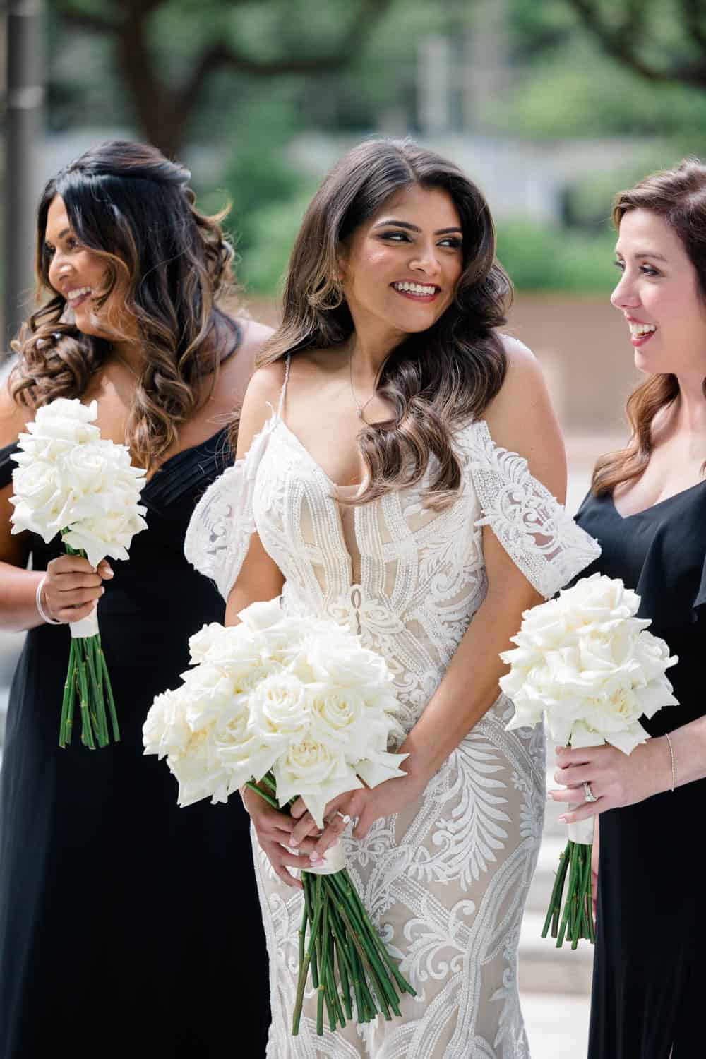 Bridal bouquet featuring white roses, perfect for weddings and special occasions.