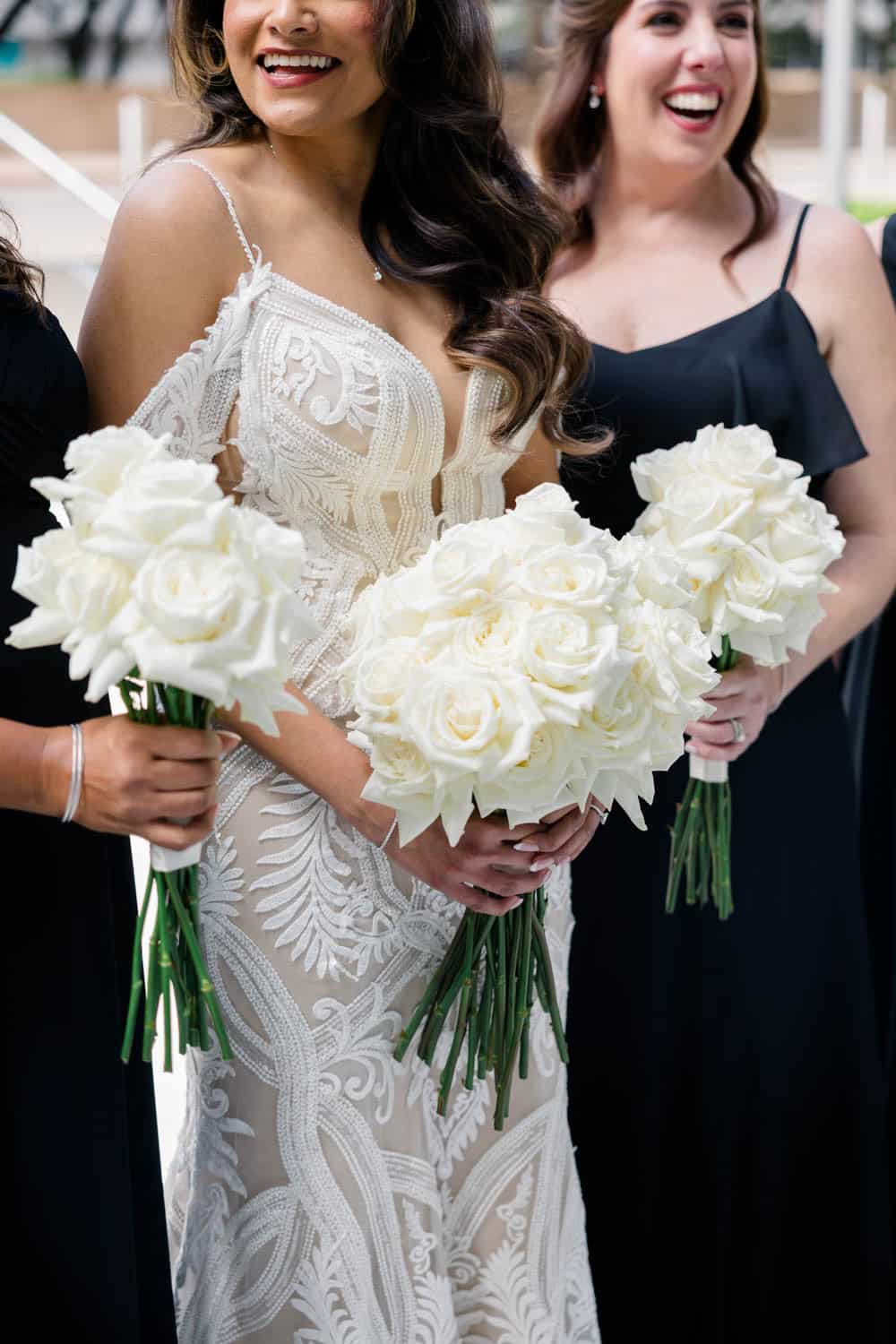 Beautiful bridal bouquets featuring white roses and hydrangeas for wedding ceremonies.
